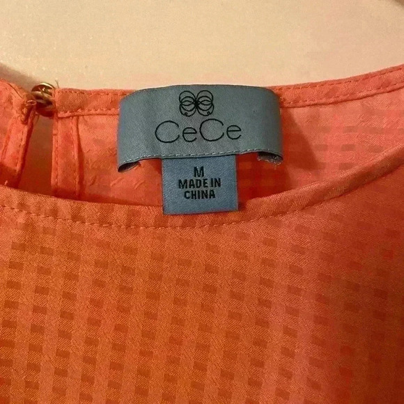 Cece beautiful peach blouse.  This blouse has bell sleeves with tie closures. - Picture 2 of 7
